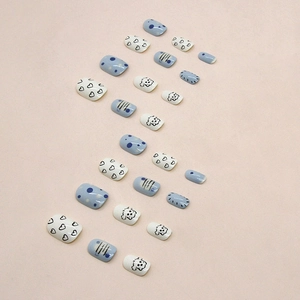 Sky blue press-on nails with cute cartoon dog and heart patterns, short square shape
