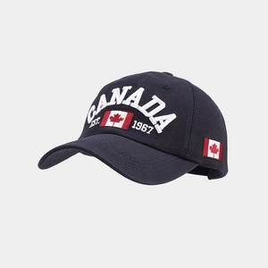 Close-up of navy cotton baseball cap featuring 3D Canada embroidery and flag detail