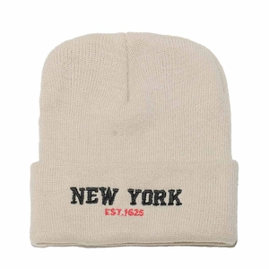 Beige knitted New York embroidery beanie hat with classic cuffed design for outdoor warmth