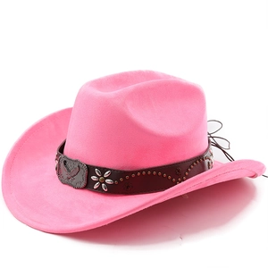 Detail of pink faux suede cowboy hat featuring leather band with eagle buckle and studs