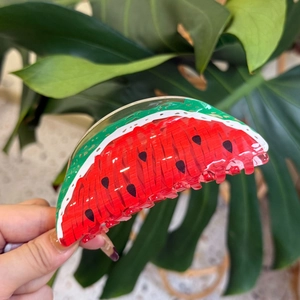 Watermelon acrylic hair claw clip with vibrant red and green colors for women