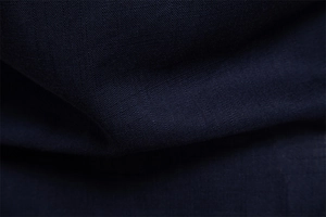 Macro texture of navy blue high-quality cotton-linen fabric for men's casual shirt