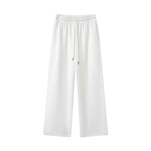 Detail of white wide-leg sweatpants showing elastic waistband with adjustable drawstrings