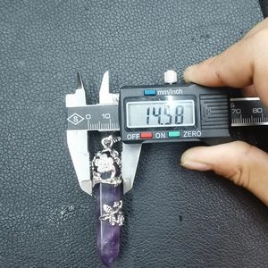 Detailed measurement showing 14.58mm width of amethyst hexagonal column pendant