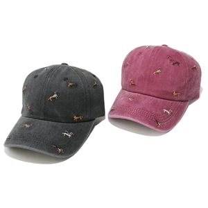 Washed cotton baseball caps in grey and burgundy with dachshund embroidery
