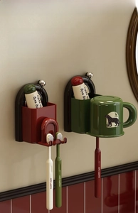 Detail of magnetic mouthwash cup set with suction wall mount and toothbrush holder hooks