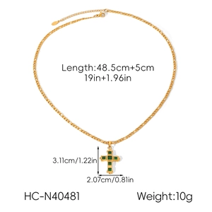 Detail of gold cross necklace with green gemstone including pendant dimensions and weight