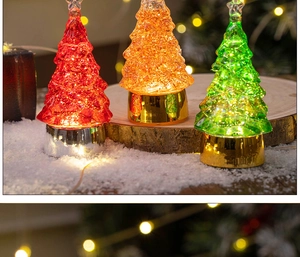 Three LED crystal Christmas trees in red, gold and green colors with star tree toppers