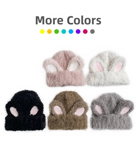 Detailed close-up showing soft plush rabbit ear knit hats in various stylish colors