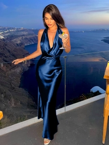 Elegant navy blue satin halter neck dress with backless design and slim waist fit