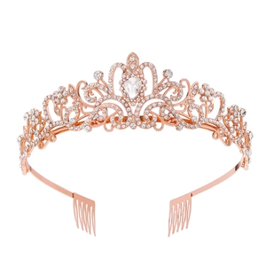 Detailed view of rose gold bridal tiara with sparkling crystals and metal hair combs