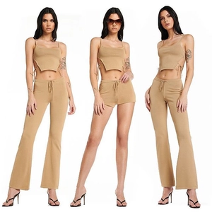 Three-piece khaki ribbed knit set with tie-up crop top, flared pants and slim shorts