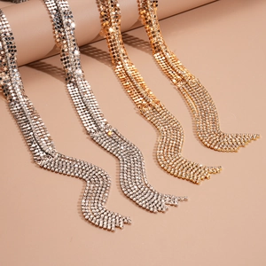 Chic gold and silver metallic mesh necklaces with long rhinestone tassel fringe details