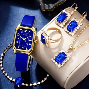 Detail view of YBOTTI jewelry set with blue rectangular stones and gold watch
