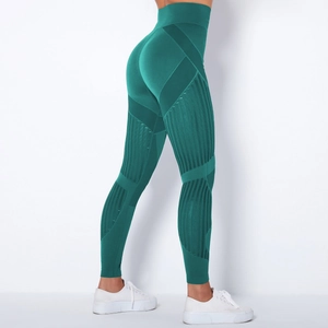 Detailansicht der High-Waist-Yogahose mit atmungsaktivem Mesh-Einsatz in dunklem Blaugrün