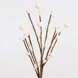 Detail of white decorative faux branch with realistic buds on brown stem for festive decor
