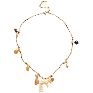 Bohemian woven rope necklace with tassel and golden horse pendant on white background