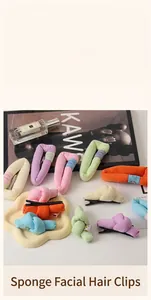 Close-up of colorful sponge hair clips in soft fabric featuring twisted and knotted styles