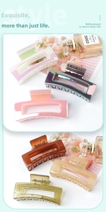 Detailed close-up of colorful jelly texture rectangular claw clips in various glossy finishes