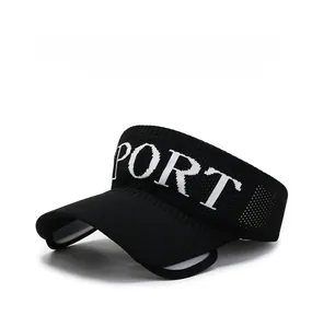 Detail of black knitted sun visor with white Sport embroidery and breathable texture