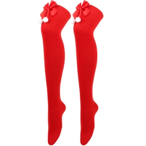 Detail view of red Christmas over-knee socks with festive bows and white pom-poms