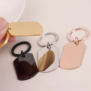 Polished stainless steel dog tag keychains in gold, silver, black, and rose gold finishes