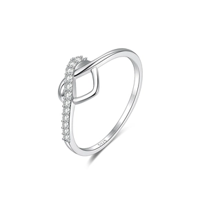 Macro view of S925 sterling silver ring showing intricate knot design and hallmarked stamp