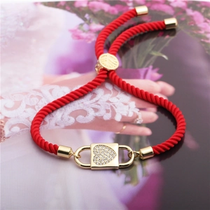 Red braided cord bracelet with gold heart padlock charm and white zircon inlay