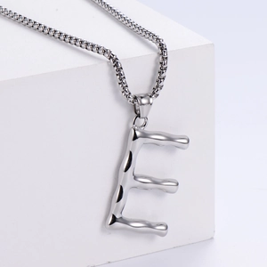 Polished silver letter E pendant necklace with ball chain for men in minimalist hip-hop style