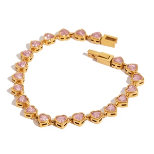 Detailed view of heart-shaped pink zircon bracelet with gold-plated stainless steel chain