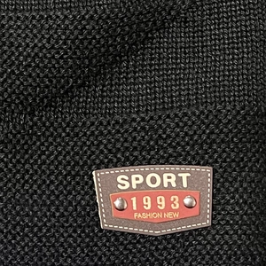 Men's winter knitted beanie with fleece lining, black thermal hat with sport leather patch