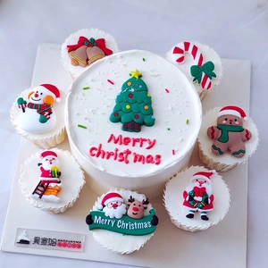 Christmas cake topper set with Santa, reindeer and tree for festive holiday baking decoration