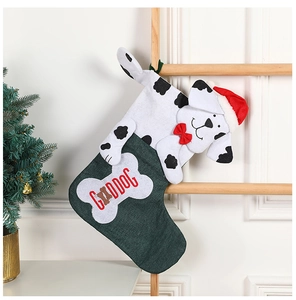 Detail of Christmas stocking with a 3D dalmatian doll and GOOD DOG bone patch