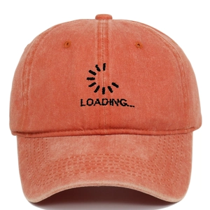 Detail of embroidered 'LOADING..' text on vintage washed orange cotton baseball cap