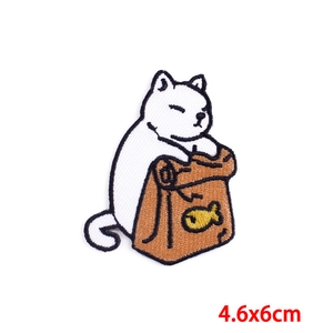 Detail view of cartoon cat embroidery patch with measurements 4.6x6cm on white background