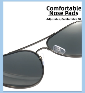 Close-up of adjustable clear silicone nose pads on double bridge aviator sunglasses