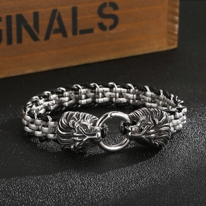 Retro stainless steel lion head bracelet featuring black braided cord and silver chain link
