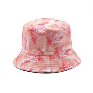 Detail of red and white abstract marble texture on reversible bucket hat with black lining