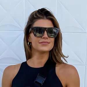 Fashionable oversized square sunglasses with tortoiseshell frames and gray tinted lenses
