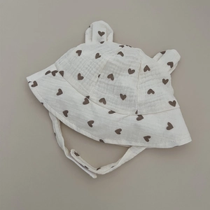 White cotton gauze baby bucket hat with cute ears and brown heart print