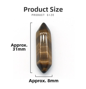 Detail showing natural tiger eye double point hexagonal crystal measuring 31x8mm