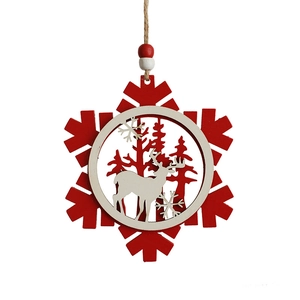 Red wooden snowflake ornament with white reindeer silhouette and forest cutouts
