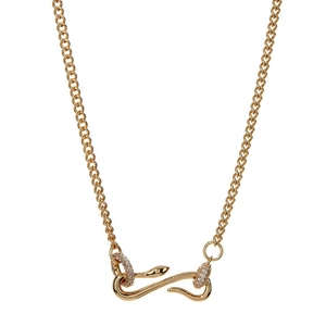 Vintage gold snake-shaped necklace with zircon crystals on a classic Cuban link chain