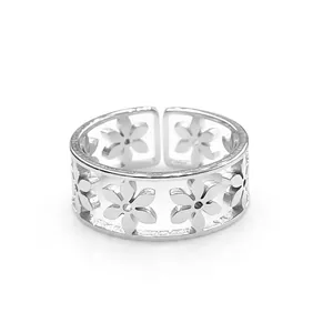 Adjustable silver stainless steel open ring featuring a minimalist hollow floral pattern