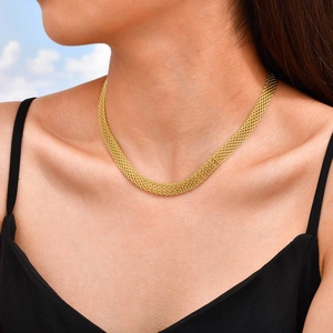 Elegant gold mesh chain necklace in 8mm width worn by model with natural sky background