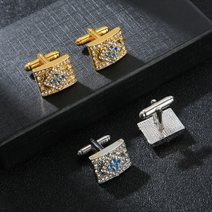 Elegant rectangle crystal cufflinks in gold and silver set with blue gemstone diamonds