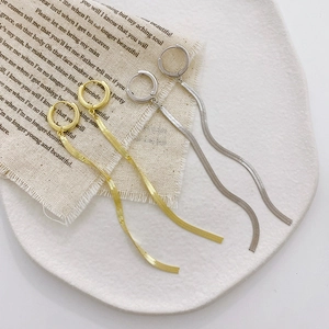 Elegant gold and silver long tassel snake chain earrings with minimalist hoop design