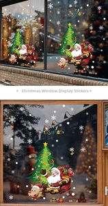 Close-up of Merry Christmas static window stickers with Santa, tree and snowflakes decor