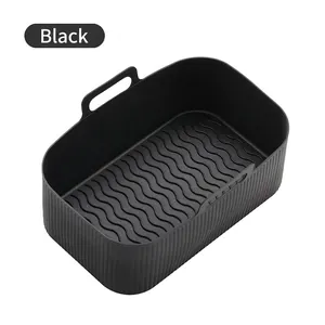 Rectangular black silicone air fryer tray with wave oil grooves and side handles