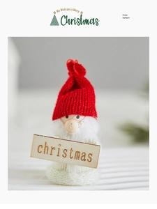Close-up of wool felt Santa doll with knitted texture and wooden Christmas sign detail